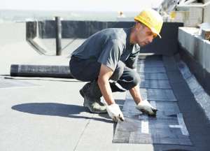 Signs to Replace Your Flat Commercial Roof
